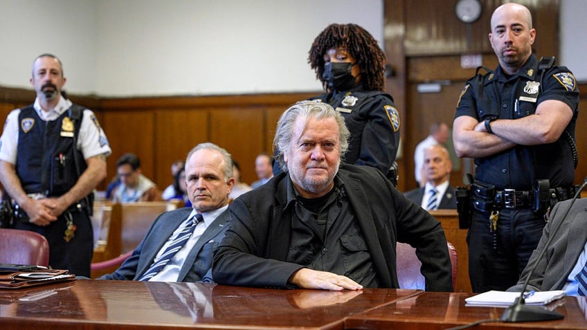 Bannon sits in courtroom