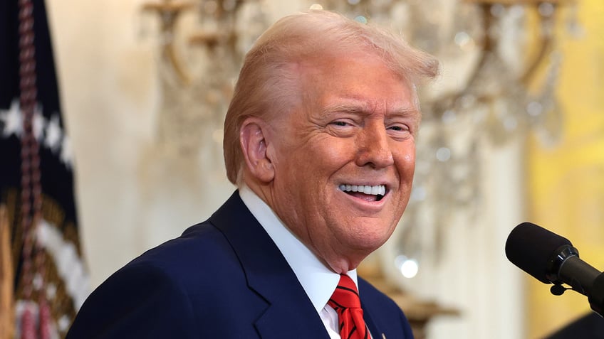 Trump smiles