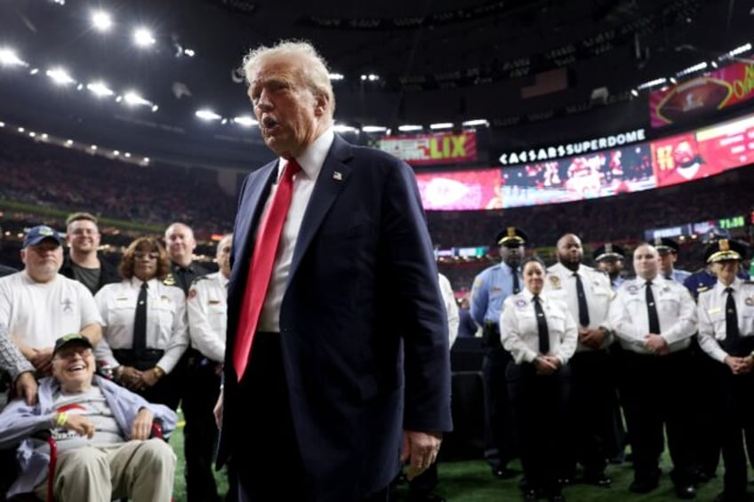 Donald Trump arrives at the New Orleans Superdome for Sunday's Super Bowl between the Kans