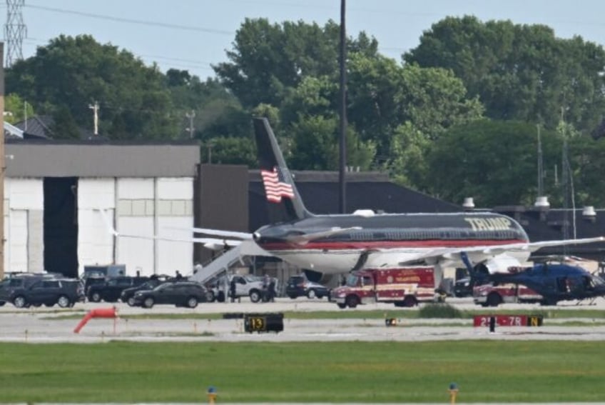 People disembark from former US president and Republican presidential candidate Donald Tru