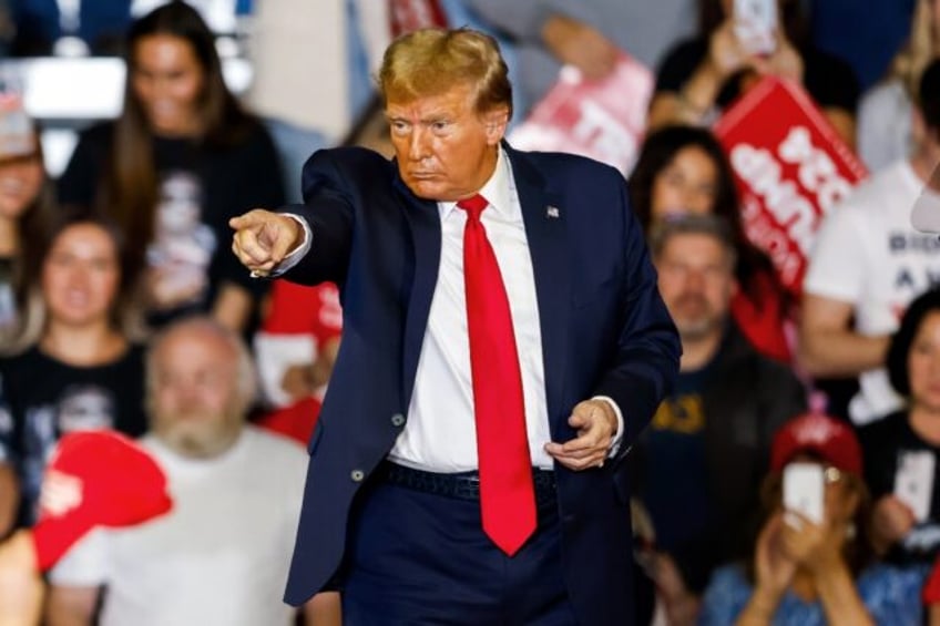 Former US president and 2024 presidential hopeful Donald Trump attends a rally in Conway,