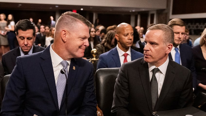 Ronald Rowe Jr. (left) speaks with Paul Abbate