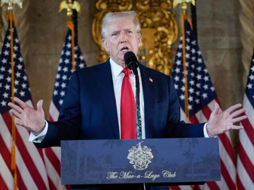 Republican presidential nominee former President Donald Trump speaks to reporters at his M