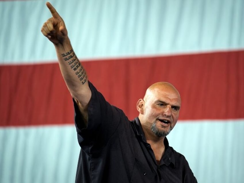 Sen. John Fetterman, D-Pa., arrives ahead of Democratic vice presidential candidate Minnes