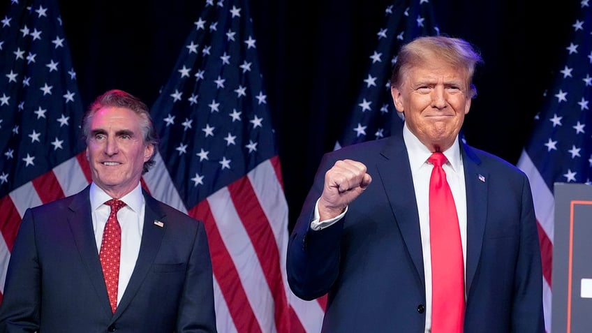 Burgum and Trump together campaigning