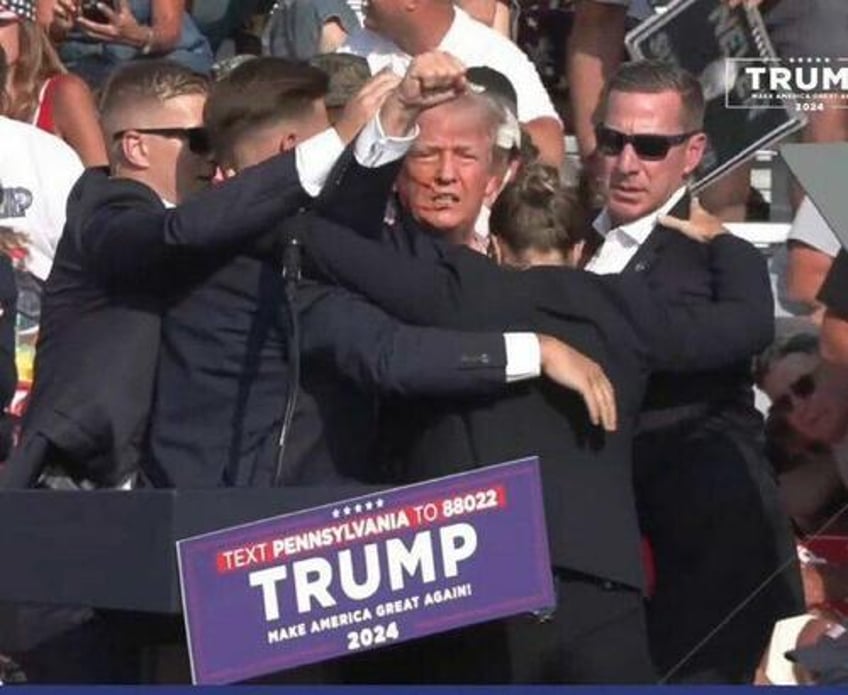 trump bleeding rushed off stage after assassination attempt at pennsylvania rally