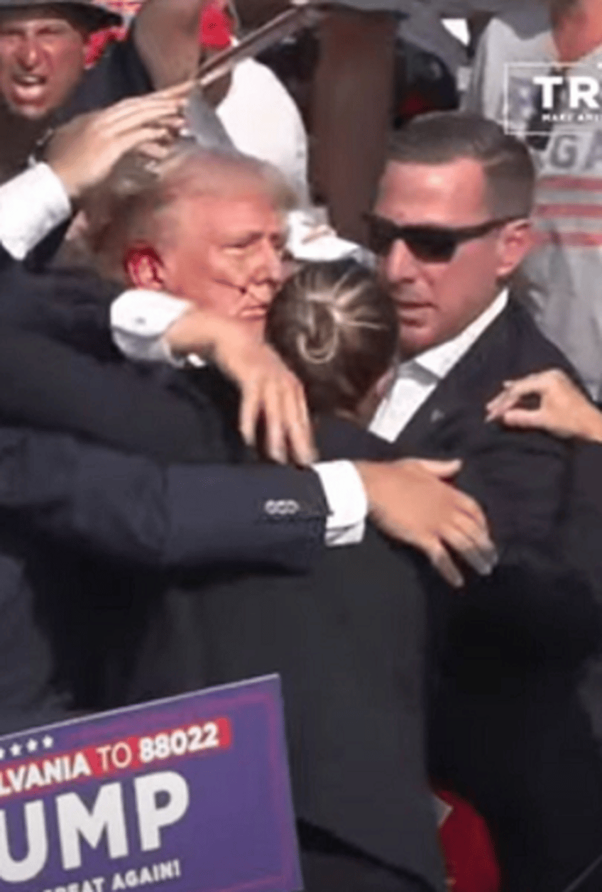 trump bleeding rushed off stage after assassination attempt at pennsylvania rally