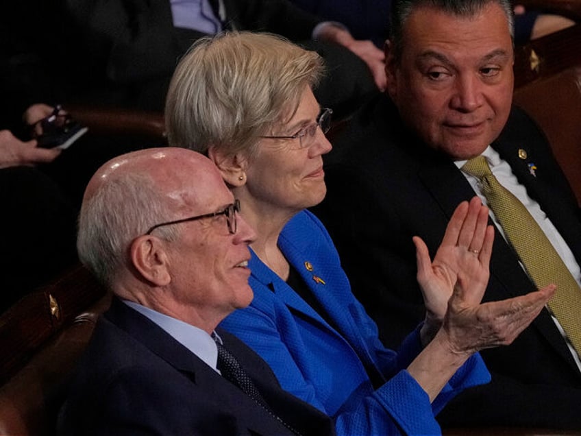 Sen. Elizabeth Warren, D-Mass., listens as President Donald Trump addresses a joint sessio