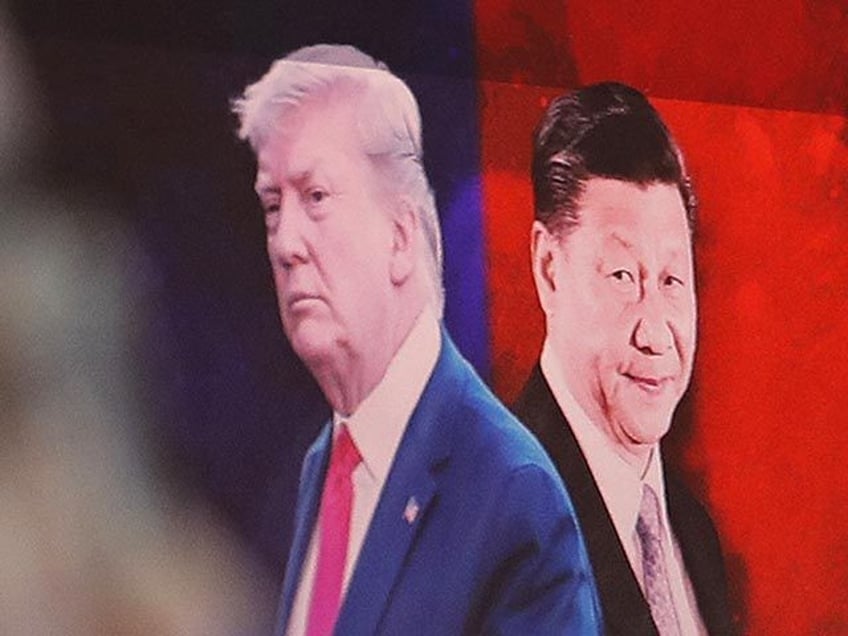 FIEL - In this Aug. 26, 2019, file photo, a computer screen shows images of Chinese Presid