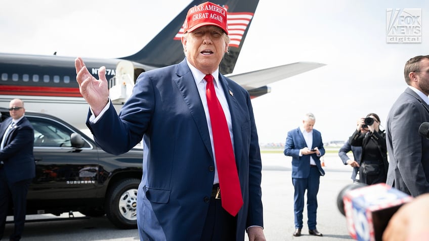 Former President Donald Trump arrives at Atlanta’s Hartsfield-Jackson Airport in Georgia