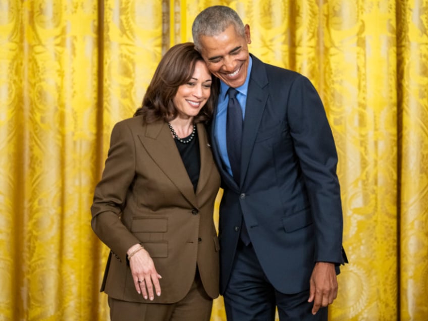 Former President Barack Obama hugs Vice President Kamala Harris during an Affordable Care Act event with President Joe Biden, Tuesday, April 5, 2022, in the East Room of the White House. (Official White House Photo by Adam Schultz)