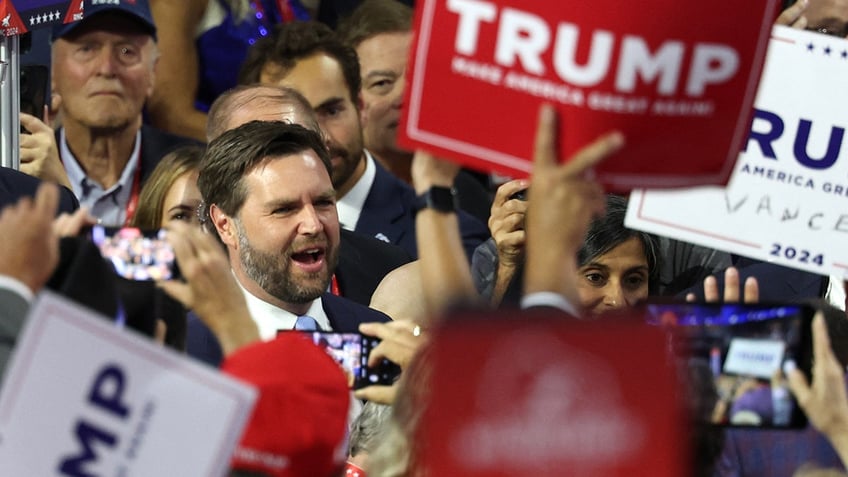 J.D. Vance is greeted by supporters as he arrives for Day 1 of the Republican National Convention