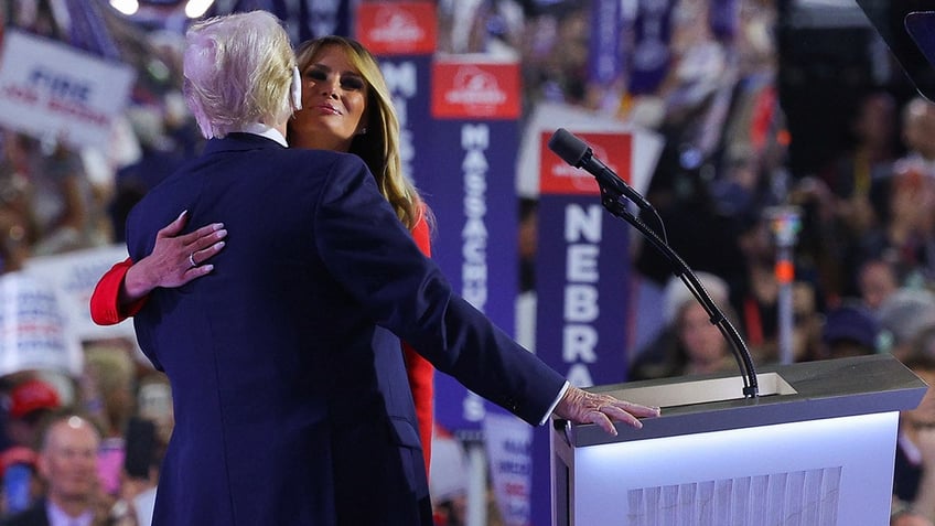 Republican presidential candidate former President Donald Trump, center, stands on stage with Melania Trump and other members of his family during the Republican National Convention