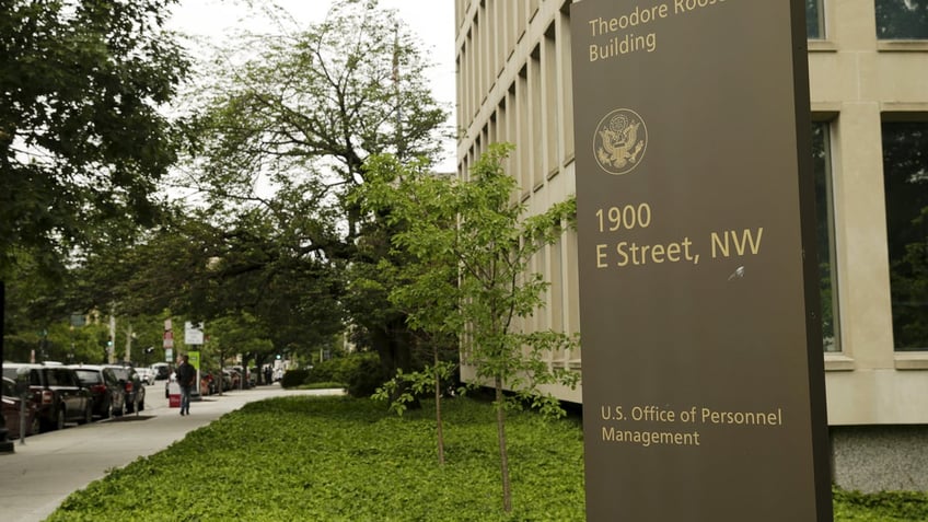 The federal government spends $163 million a year on union perks, but no one knows how much more it spends negotiating with unions. FILE: The U.S. Office of Personnel Management building in Washington June 5, 2015. (REUTERS/Gary Cameron)