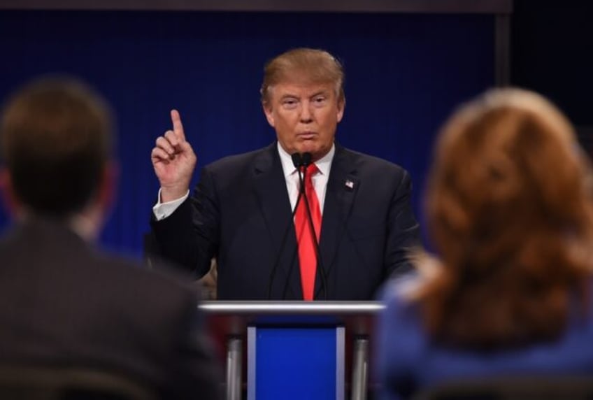 trump center stage despite threat to skip republican debate