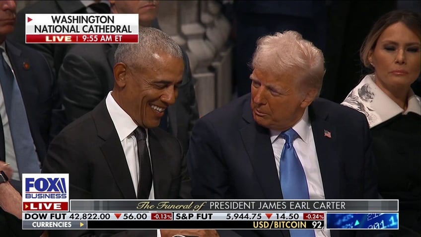 Obama laughing, left, as Trump talks with him