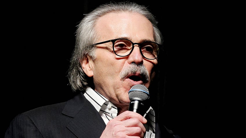 David Pecker speaking in microphone