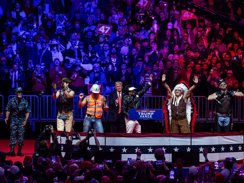 The Village People perform during a rally with US President-elect Donald Trump at Capital