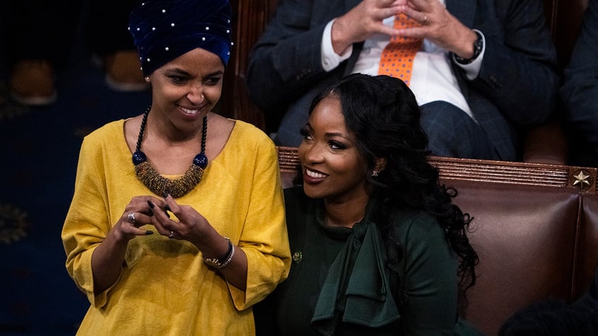 Ilhan Omar and Jasmine Crockett on the House floor