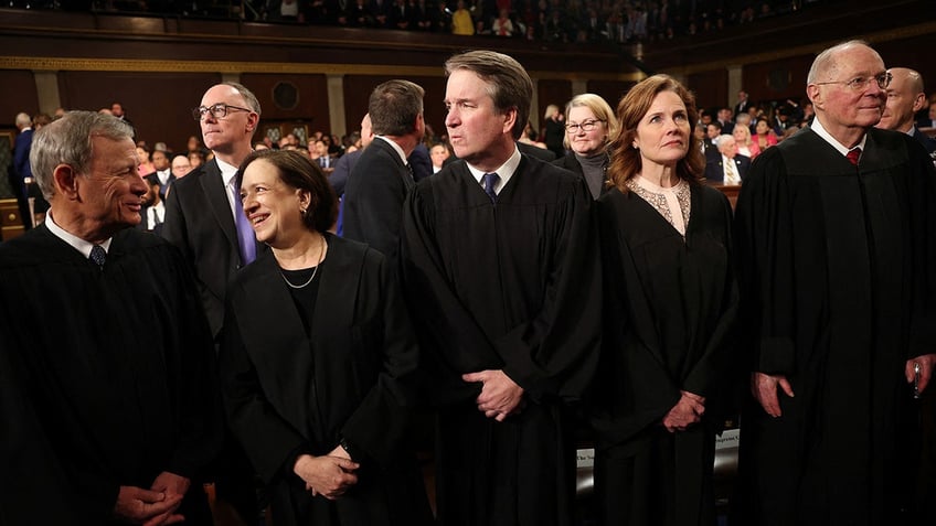 WASHINGTON, DC - MARCH 04: Chief Justice of the Supreme Court John Roberts, Justice Elena Kagan, Justice Brett Kavanaugh, Justice Amy Coney Barrett, and retired Justice Anthony Kennedy attend U.S. President Donald Trump's address to a joint session of Congress at the U.S. Capitol on March 04, 2025 in Washington, DC.     Win McNamee/Pool via REUTERS