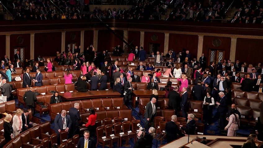 Lawmakers arrive for a joint session of Congress in the House Chamber of the US Capitol in Washington, DC, US, on Tuesday, March 4, 2025. Donald Trump's primetime address Tuesday night from Capitol Hill, billed as a chronicle of his "Renewal of the American Dream," comes at a critical juncture early in his second term, as voters who elected him to tackle inflation and improve the economy are beginning to weigh the impact of his agenda. Photographer: Al Drago/Bloomberg via Getty Images