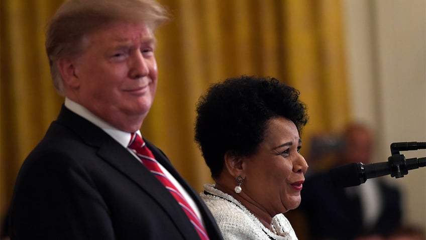 President Trump reacts as former prisoner Alice Johnson speaks at the Prison Reform Summit and First Step Act Celebration in the East Room of the White House, April 1, 2019. (AP Photo/Susan Walsh)