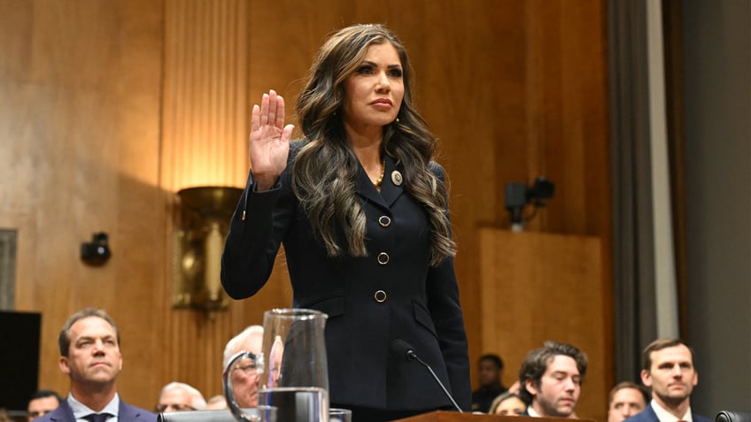 South Dakota Gov. Kristi Noem is sworn in during a Senate Homeland Security and Governmental Affairs Committee hearing on her nomination to be secretary of Homeland Security, on Capitol Hill in Washington, D.C., on Jan. 17, 2025.