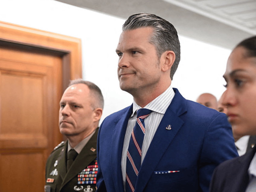 US Secretary of Defense Pete Hegseth (C) arrives to testify before a Senate Appropriations