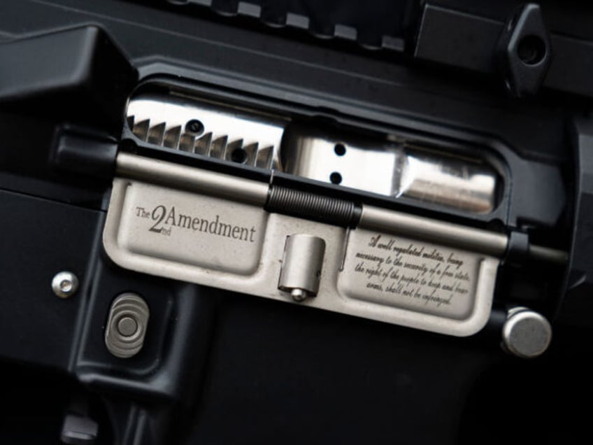 RICHMOND, VA - JANUARY 15: A an AR-15 rifle variant with a dust cover engraved with the 2n