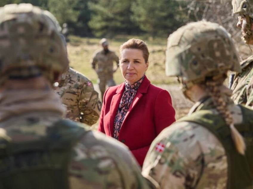 Danish Prime Minister Mette Frederiksen meets conscripts during a visit to Air Base Karup,