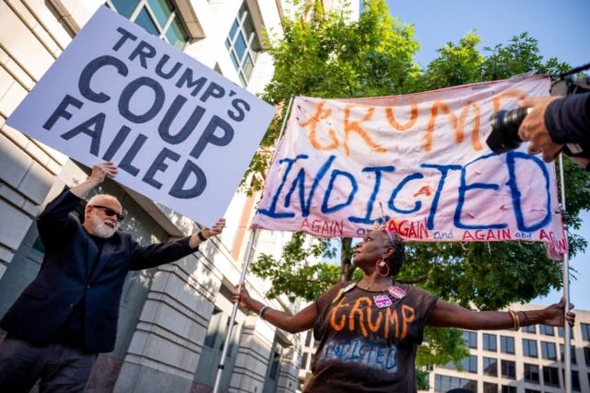 Protesters outside the Washington courthouse during a hearing in former president Donald T
