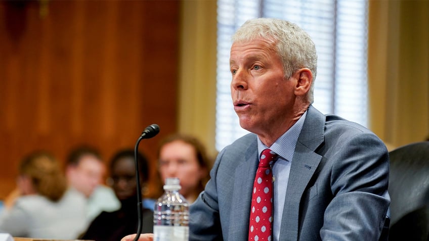 Chris Wright closeup shot from testifying before Senate