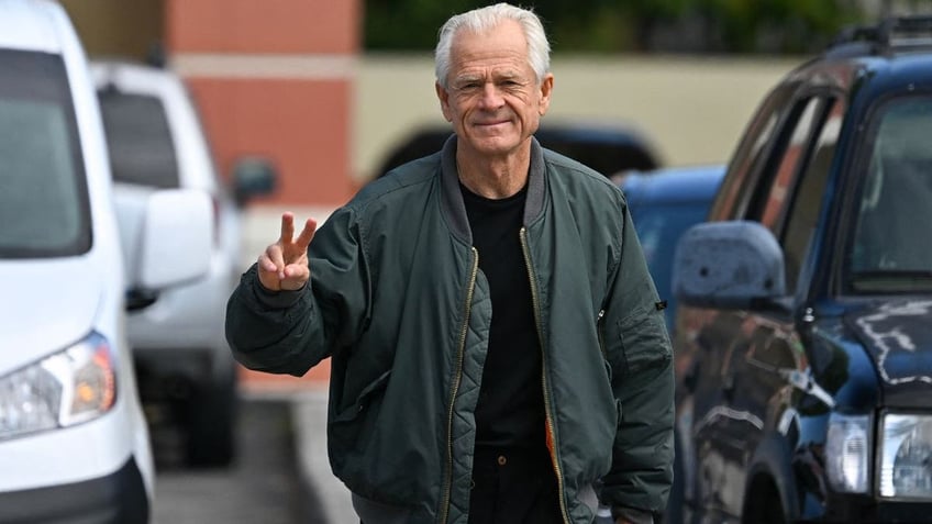 Peter Navarro, White House trade adviser to former President Donald Trump, arrives to speak to the press at the Country Mall Plaza before reporting to the Federal Correctional Institution, in Miami, Florida on March 19, 2024. 