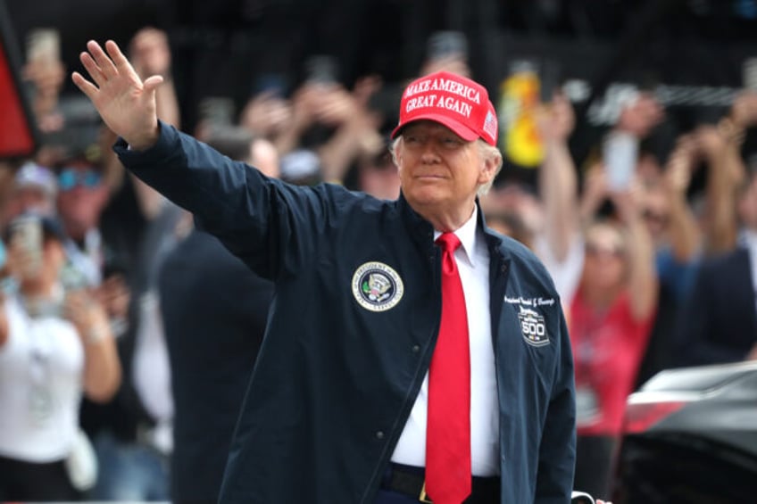 DAYTONA BEACH, FL - FEBRUARY 16: President of the United States Donald J. Trump waves to