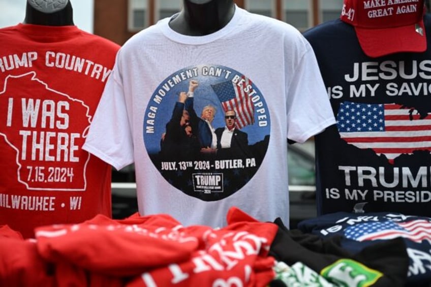 Among the souvenirs on sale are T-shirts printed with the photograph of Donald Trump defia