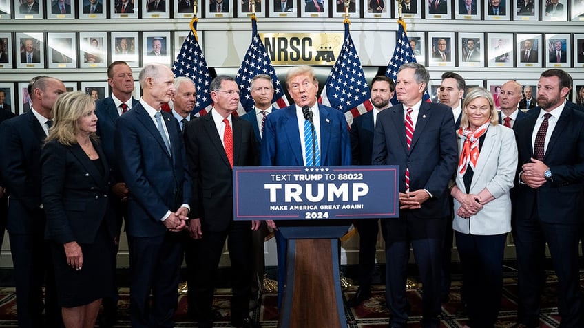 Donald Trump at lectern with Senate Republicans 