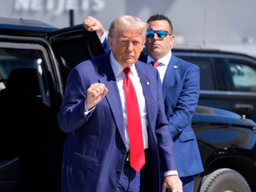 Republican presidential nominee former President Donald Trump gestures as he arrives at Ha