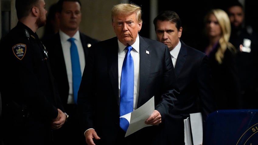 Donald Trump speaks to members of the media at Manhattan Criminal Court