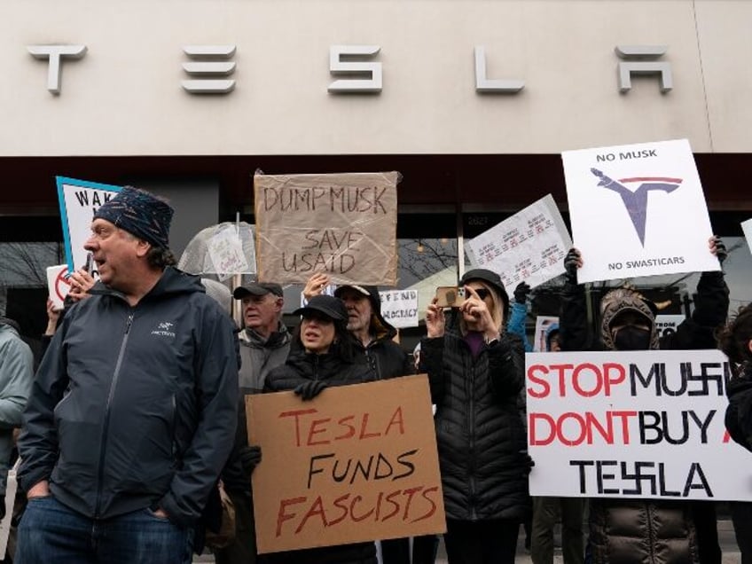 protesters target Elon Musk's Tesla and Donald Trump