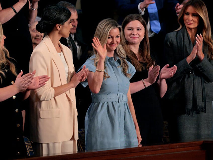 WASHINGTON, DC - MARCH 04: January Littlejohn (2-R) reacts as Second Lady Usha Vance (L) a