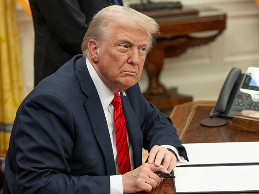 President Donald Trump signs Executive Orders, Monday, February 10, 2025, in the Oval Offi
