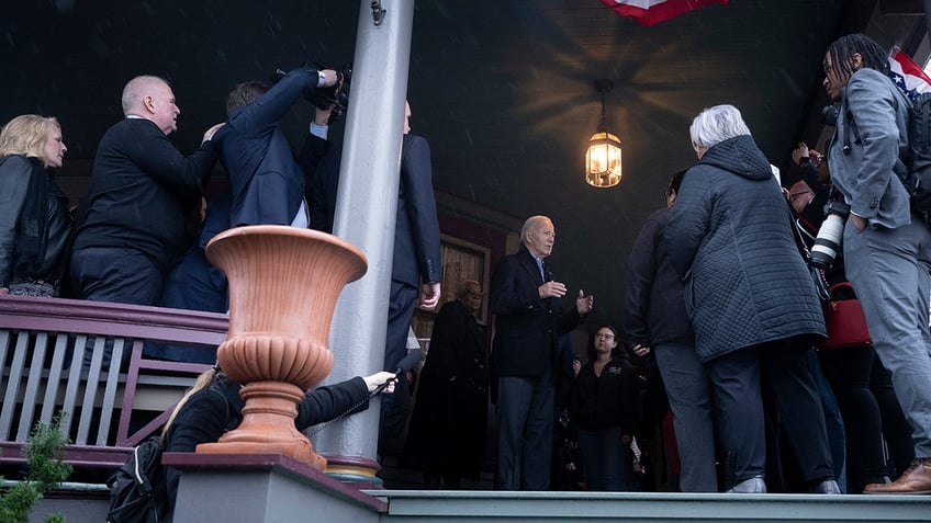 Biden on a porch in Michigan