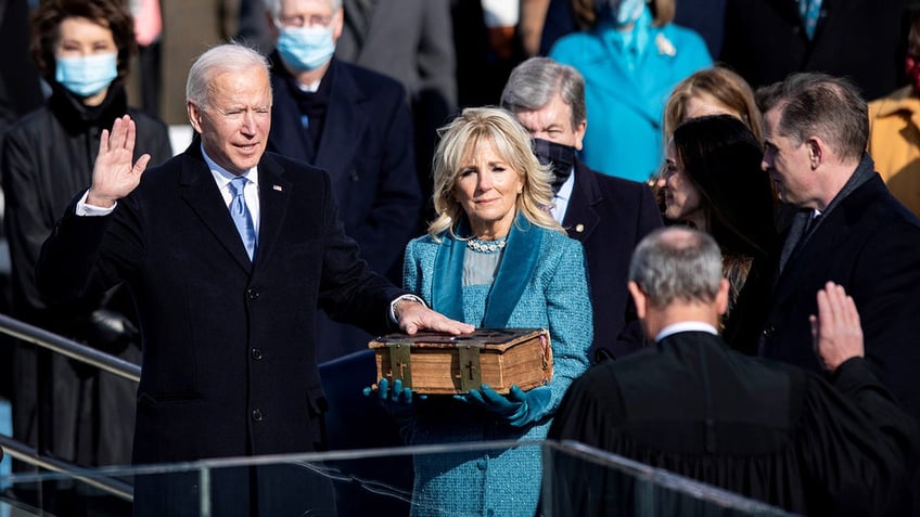 President Biden, with wife Jill Biden, takes the oath of office at his inauguration