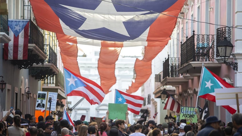 Protesters demand the resignation of Gov. Wanda Vázquez Garced during a demonstration, Jan. 20, 2020, in San Juan, Puerto Rico.