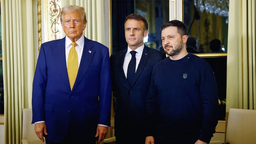 France's President Emmanuel Macron (C), US president-elect Donald Trump (L) and Ukraine's President Volodymyr Zelensky pose before a meeting at The Elysee Presidential Palace in Paris on December 7, 2024.