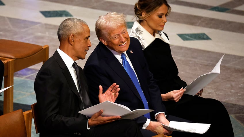 Obama and Trump at funeral