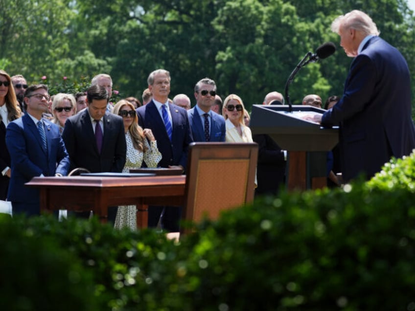 President Donald Trump speaks as House Speaker Mike Johnson, R-La., from front row left, S