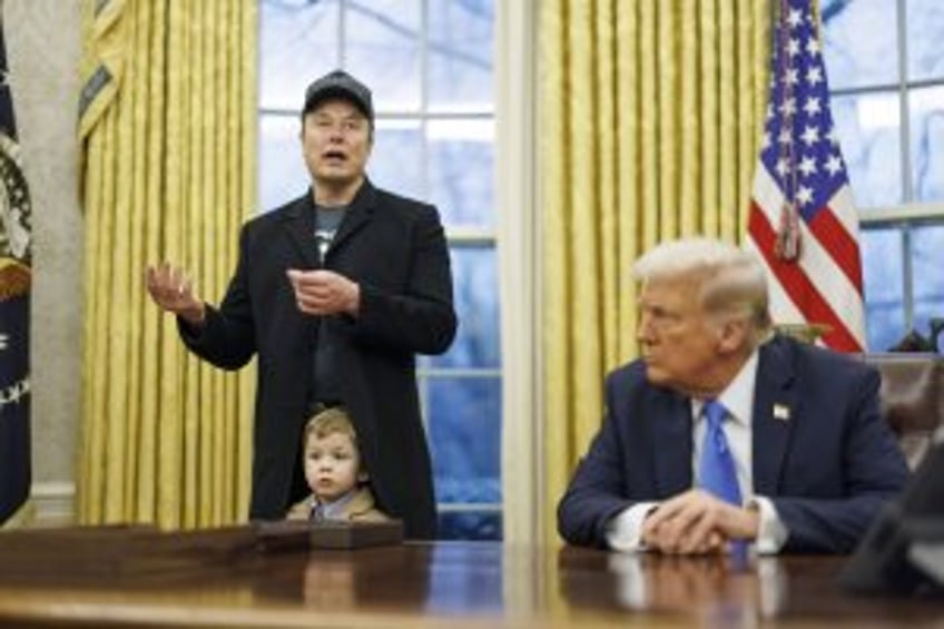 Trump orders 'large-scale' cuts in federal workforce as Elon Musk defends DOGE