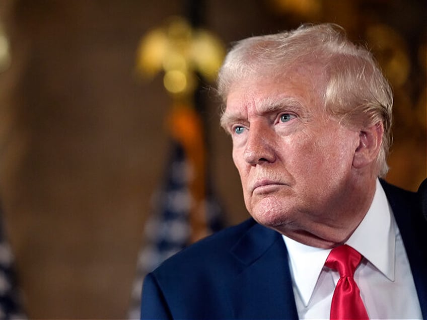 Republican presidential nominee former President Donald Trump speaks to reporters during a