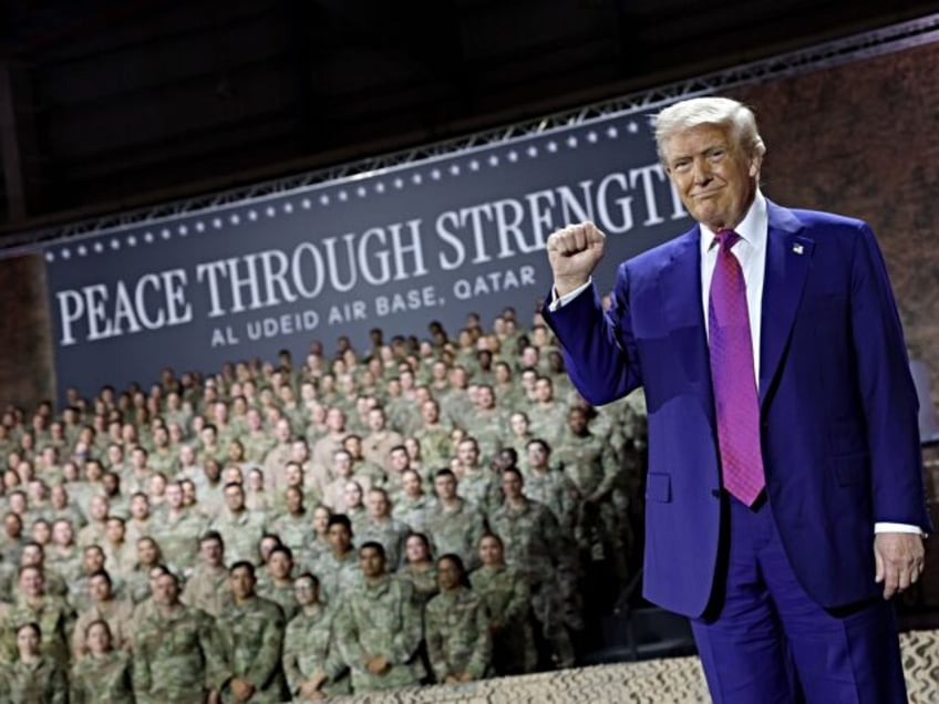 DOHA, QATAR - MAY 15: U.S. President Donald J. Trump gestures on stage as he tours the Al